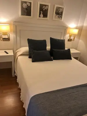 Cama o camas de una habitación en Hostal Plaza