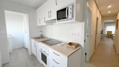 Una cocina o zona de cocina en La Casa de la Muralla