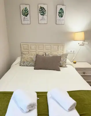 Cama o camas de una habitación en La Casa de la Muralla