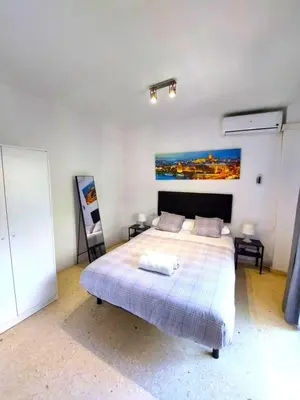 Cama o camas de una habitación en Fray Isidoro Apartment