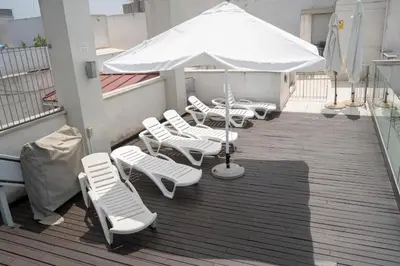 Un balcón o terraza de Rastro Jardines de Murillo, by Homing U