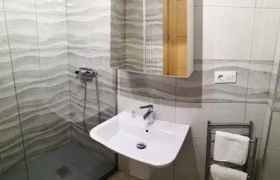 Un baño de Muro de los Navarros 26-Apartamentos