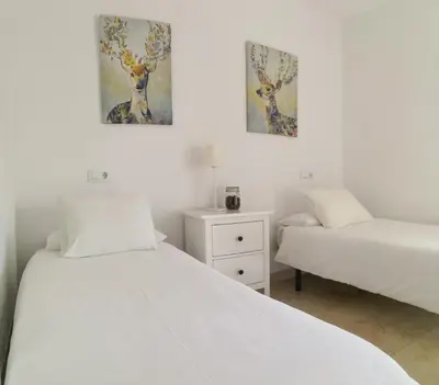Cama o camas de una habitación en Muro de los Navarros 26-Apartamentos