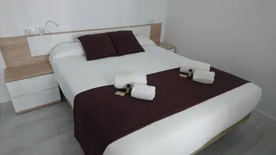 Cama o camas de una habitación en El Patio De La Piscina