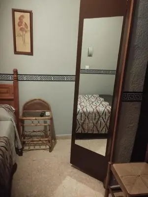 Cama o camas de una habitación en Hospedería Lucano