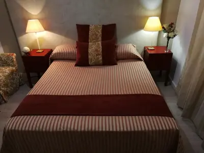 Cama o camas de una habitación en Hostal Maestre