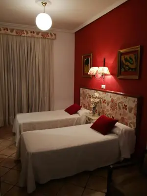 Cama o camas de una habitación en Hostal Maestre