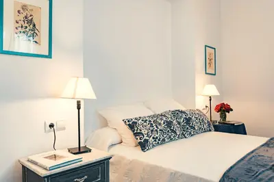 Cama o camas de una habitación en Apartamentos San Pedro