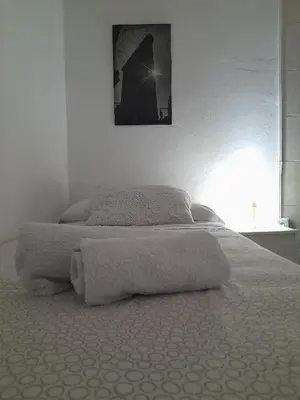 Cama o camas de una habitación en Pensión Hidalgo 2
