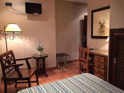 Cama o camas de una habitación en Hotel Baviera