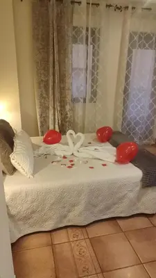 Cama o camas de una habitación en Hotel Baviera