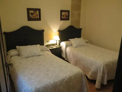 Cama o camas de una habitación en La Casa del Seise