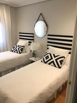Cama o camas de una habitación en Apartamento las doblas , parking gratis