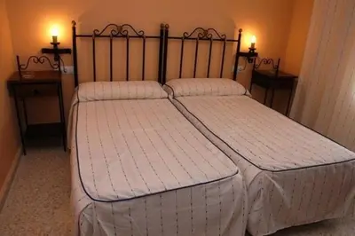 Cama o camas de una habitación en Hotel Don Juan