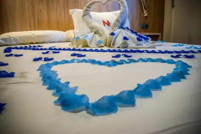 Cama o camas de una habitación en Hotel Nomada
