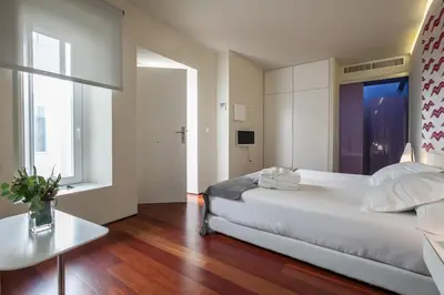 Cama o camas de una habitación en Hotel Viento10