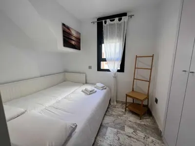 Cama o camas de una habitación en Ático San Bernardo Terraza y Parking Incluido