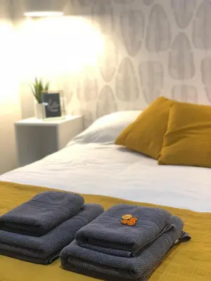 Cama o camas de una habitación en Azafran Suites