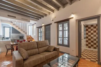 Zona de estar de Casas de Sevilla - Apartamentos Tintes12