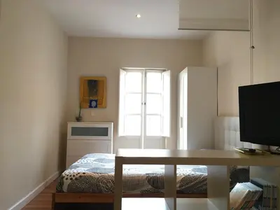 Cama o camas de una habitación en Vidrio Apartment
