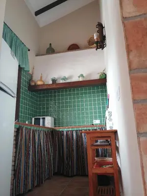 Una cocina o zona de cocina en La solana de turon. El pino