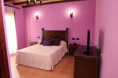 Cama o camas de una habitación en Hotel Rural Romero Torres