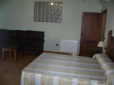Cama o camas de una habitación en Hotel Rural Romero Torres
