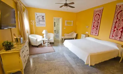 Cama o camas de una habitación en Hostal Nueva Andalucia