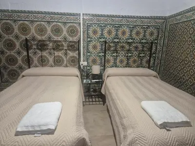 Cama o camas de una habitación en Pensión Javier