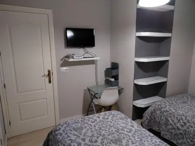 Cama o camas de una habitación en Apartamento con parking privado gratis incluido