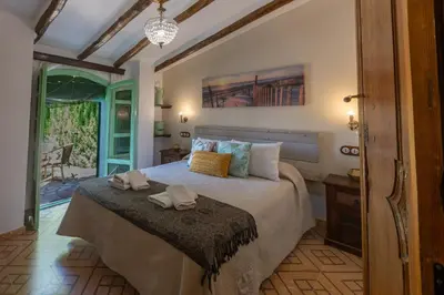 Cama o camas de una habitación en El Rincon de Carmen