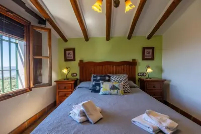Cama o camas de una habitación en El Rincon de Carmen