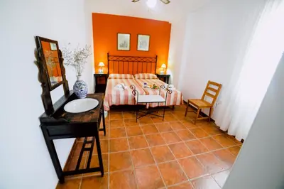 Cama o camas de una habitación en Casa Rural San Antonio
