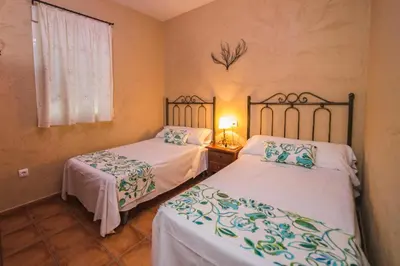 Cama o camas de una habitación en Agroturismo Ecologico el Cortijillo