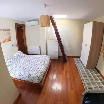 Cama o camas de una habitación en Loft con vistas en Plaza de Belén