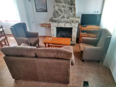 Zona de estar de Mágina Dream La Guardia, apartamentos rurales en montaña