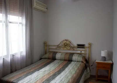 Cama o camas de una habitación en Hostal Casa Jose
