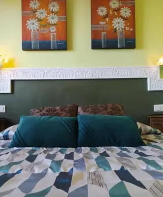 Cama o camas de una habitación en Hotel Sierra de Araceli Lucena