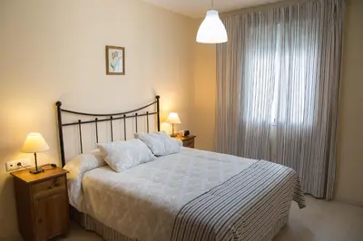 Cama o camas de una habitación en Apartamento Torcal Écija