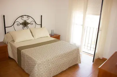 Cama o camas de una habitación en Casita Ardales
