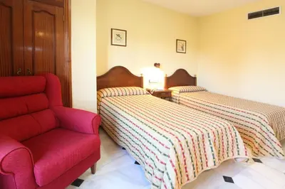 Cama o camas de una habitación en El Cisne