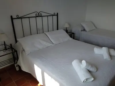 Cama o camas de una habitación en Alojamiento Rural El Orégano