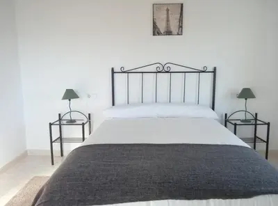 Cama o camas de una habitación en Alojamiento Rural El Orégano