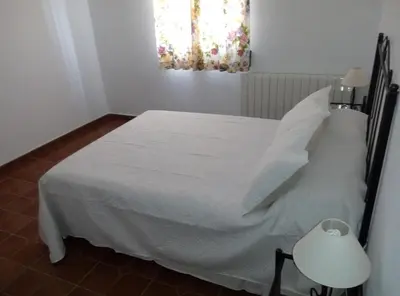 Cama o camas de una habitación en Alojamiento Rural El Orégano