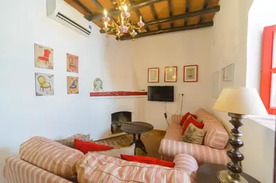 Una televisión o centro de entretenimiento en Casa Spa La Agueda y Robledo