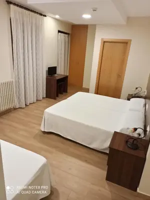 Cama o camas de una habitación en Hosteria de Rafi