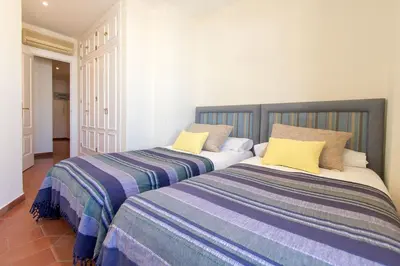 Cama o camas de una habitación en Flamencos Apartamento con garage 5 pax
