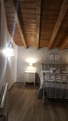 Cama o camas de una habitación en Casas Rurales Almoguer
