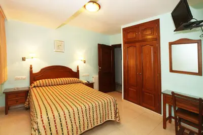 Cama o camas de una habitación en El Cisne Verde