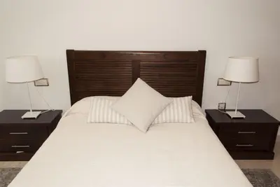 Cama o camas de una habitación en Céntrico, parking privado, al lado estación tren.